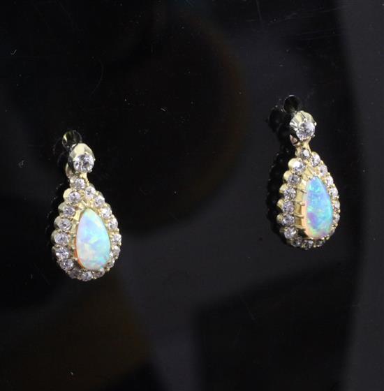A pair of early 20th century gold, white opal and diamond drop earrings, approx. 14mm.